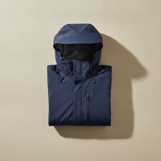 Navy technical rain jacket, folded